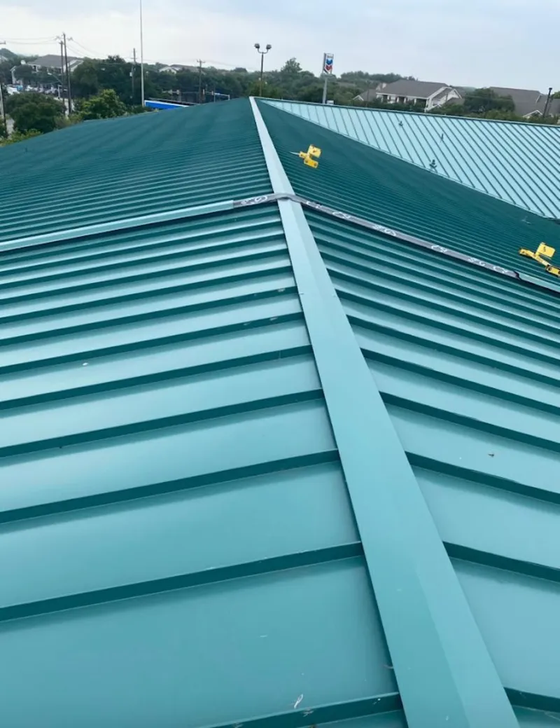 Green commercial metal roof ridge and valley for Metal Roof Repair in Fruitport